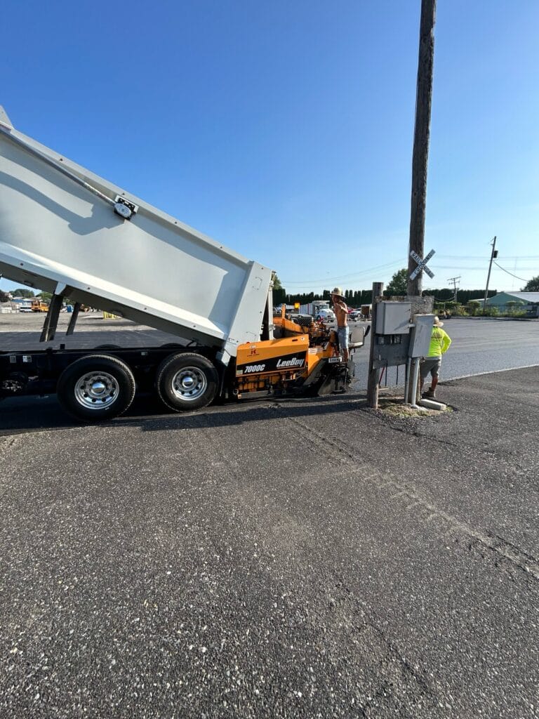 Truck unloading at construction site